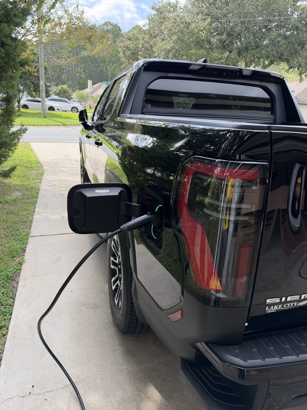 GMC Sierra EV charging from a Level 2 EV charger installed by Pure Power Electrical in The Gables, Mandarin, Jacksonville, FL
