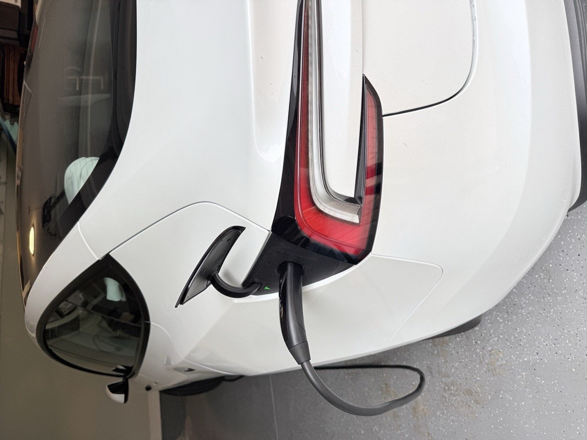 Tesla Model 3 charging port closeup at Jacksonville installation